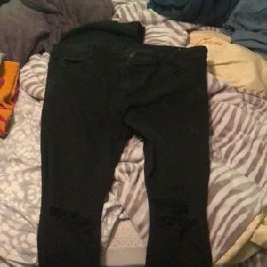 Barely worn mid rise with holes in the knees